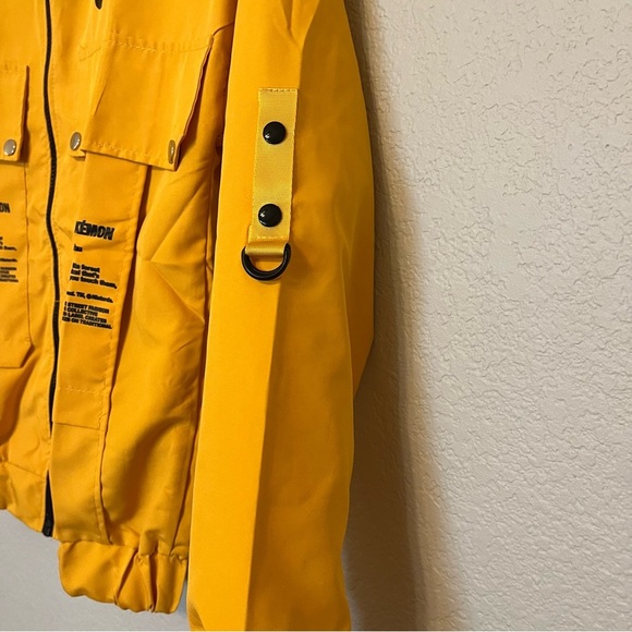 Nike 10 Deep X Pokemon Pikachu Trainer Yellow Windbreaker Jacket Medium - Picture 6 of 13